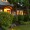 Outdoor Living - Landscape Lighting and Lush Greenery Revitalize Outdoor Living Space